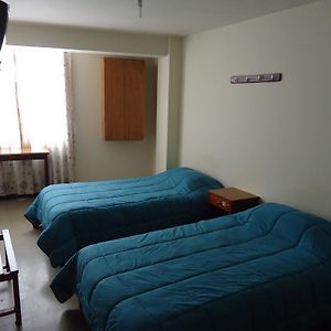 Zimmer mit zwei Einzelbetten